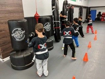 WE TRAIN OUR STUDENTS TO PRACTICE CONSISTENCY AND COMMITMENT